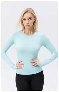 Tight long-sleeve light blue yoga shirt for women, sun protection and breathable fitness top.