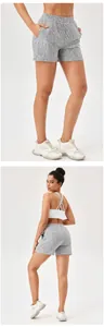 Full length front and back views of women's patterned high-waist quick-dry sports shorts