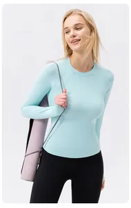 Professional model wearing a light blue tight-fit yoga long sleeve shirt for sun protection