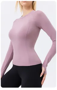 Close-up of a lavender long-sleeved tight-fitting yoga top for women with thumb hole design.