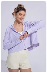 Detail view of light purple loose hooded sun protection jacket with thumbholes