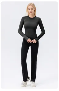 Full view of women's black long sleeve yoga top with breathable sun protection fabric