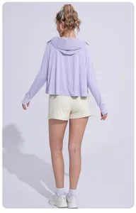 Back view of a loose lavender hooded UV protection jacket for women's outdoor sports