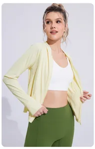 Detailed view of women's pale yellow cooling sun protection jacket with zip-up front