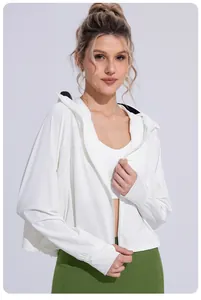 Close-up detail of a white ice silk sun protection jacket featuring a black brimmed hood