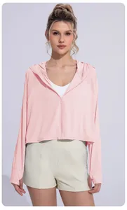 Front view of a breathable light pink hooded sun protection jacket for outdoor sports
