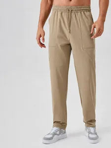 Men's professional loose fit outdoor athletic pants in khaki color with moisture-wicking fabric
