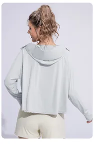 Back view of women's loose ice silk hooded sun protection jacket for outdoor sports.