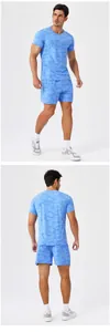 Detail view showing front and back of blue camo quick-dry men's sports t-shirt and shorts.