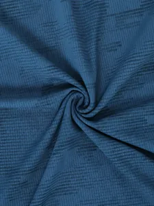 Detailed close-up of the breathable blue quick-dry mesh fabric for men's sports t-shirt