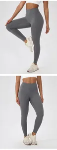 High-quality close-up views of grey high-waisted yoga leggings on model for fitness and running.