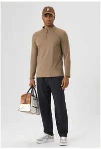 Detailed front view of men's thermal half-zip sports long-sleeve top in khaki