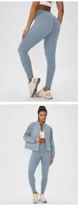 High-waisted peach lift yoga leggings and matching athletic jacket set in light blue
