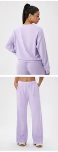 Detailed close-up of lavender purple waffle knit lounge set top and wide leg pants