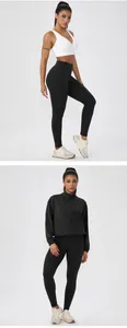 Full view of black high-waisted peach lift yoga pants and matching sports jacket set