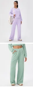 Detail view of women's waffle knit sportswear set in purple and sage green colors