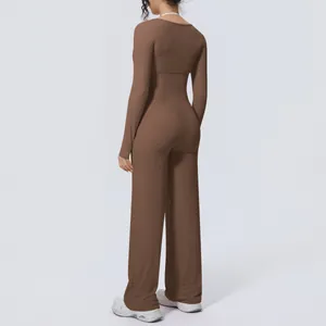 Back view of women's coffee brown long sleeve yoga set with wide leg pants
