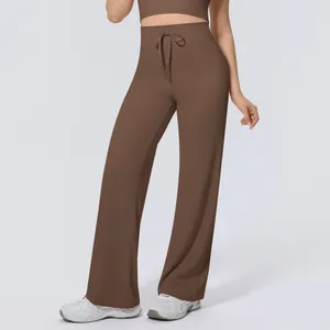High-waisted chocolate brown wide-leg sports pants featuring a functional drawstring waist.