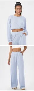 Detail view of light blue waffle knit lounge set with cropped top and wide-leg pants