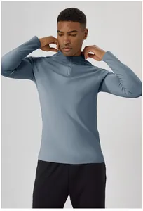 Detail of men's half-zip fleece-lined sports top for winter outdoor fitness