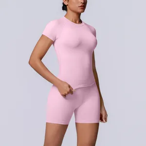 Professionele roze naadloze gebreide yogaset voor dames met een sportief silhouet