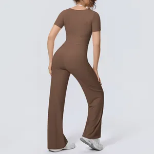 Professional back view of brown two-piece yoga set with short-sleeve top and wide-leg pants