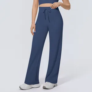 High-waisted wide-leg yoga pants with adjustable drawstring detail in a slate blue color