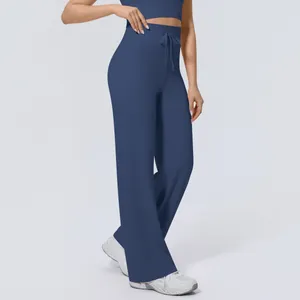 High-waisted navy blue wide-leg yoga pants featuring an adjustable drawstring waist design