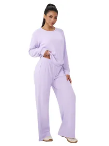 Two-piece lavender waffle knit lounge set with long sleeve top and wide leg pants