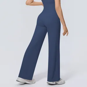 Back view of high-waisted wide-leg yoga pants in dark blue soft moisture-wicking fabric
