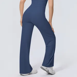 Detail view of navy blue high-waisted wide-leg yoga pants featuring a relaxed fit and soft fabric