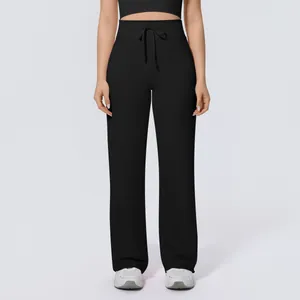 Detailed front view of black high-waisted wide-leg yoga pants with adjustable drawstring
