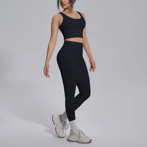 Black two-piece high-waisted yoga set for women, including sports bra and leggings