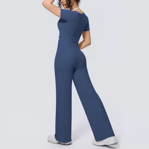 Navy blue two-piece yoga set with short sleeve top and wide leg pants for women