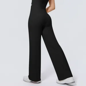 Detail of black high-waisted wide-leg yoga pants showing a flattering naked feel fit.