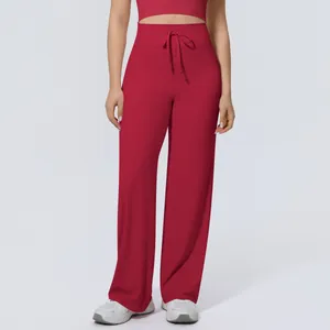 High-waisted wide-leg yoga pants featuring adjustable drawstring and soft fabric texture