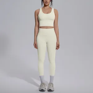 Close-up of cream yoga set featuring a V-neck sports bra and high-waisted leggings