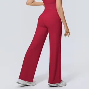 Detail view showing the back fit of high-waisted red wide-leg flare yoga pants for gym