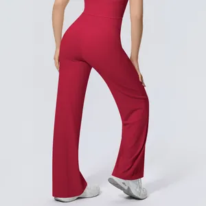 Detailed rear view of high-waisted red wide-leg yoga pants for a flattering fitness look