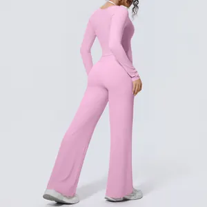 Two-piece pink long sleeve yoga set with high waist wide leg pants for fitness wear