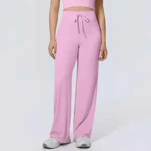 High-waisted pink wide-leg yoga pants with drawstring, loose and comfortable fitness wear