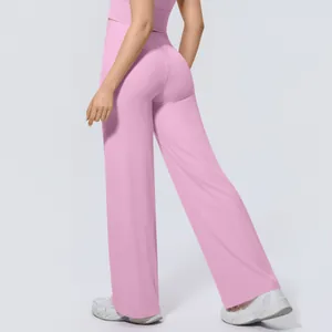 Back view of pink high-waisted wide-leg yoga pants for fitness and casual wear