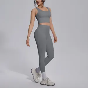 Detailed full body view of grey yoga set showing the sleek fit and seamless design
