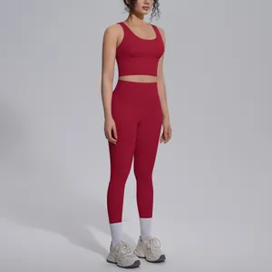 Professional red two-piece yoga set featuring V-neck sports bra and high-waisted leggings