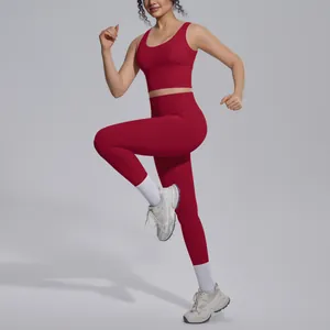 Deep red seamless yoga set featuring a V-neck sports bra and high-waisted gym leggings for women.