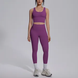 Full view of purple V-neck sports bra and high-waisted leggings yoga set on a model