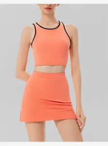 Oranges Tennis-Set für Damen mit atmungsaktivem Crop-Top und Sportrock für Fitness