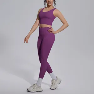 Full view of women's purple yoga set with V-neck sports bra and high-waisted leggings