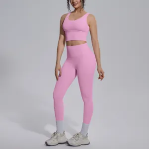 Pink two-piece yoga set with naked-feel high waist leggings and sports bra outfit