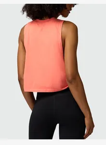 Back view of a peach-colored loose cropped sports tank top for women's yoga training